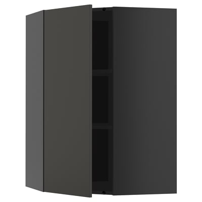 Black METOD wall cabinet with two adjustable shelves and reversible door.