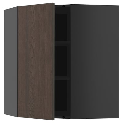 Open dark grey ikea METOD kitchen cabinet with dark wood grain door, showing interior shelves.