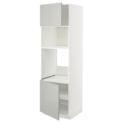 A white METOD kitchen cabinet with grey doors, tall and rectangular, open to reveal shelves.