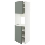 Modern kitchen unit with grey-green doors, white frame, and adjustable shelves.