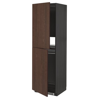 A tall dark brown wooden cabinet with two doors slightly open, revealing shelves inside.