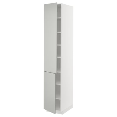 White tall cabinet, part of the METOD kitchen system, featuring multiple shelves and two doors. Modern, clean design with light grey finish.