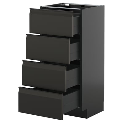A dark gray METOD kitchen cabinet with four open drawers, featuring a sleek, modern design with integrated handles.