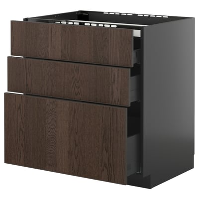 Modern dark brown wood cabinet with three open drawers and sleek black sides.
