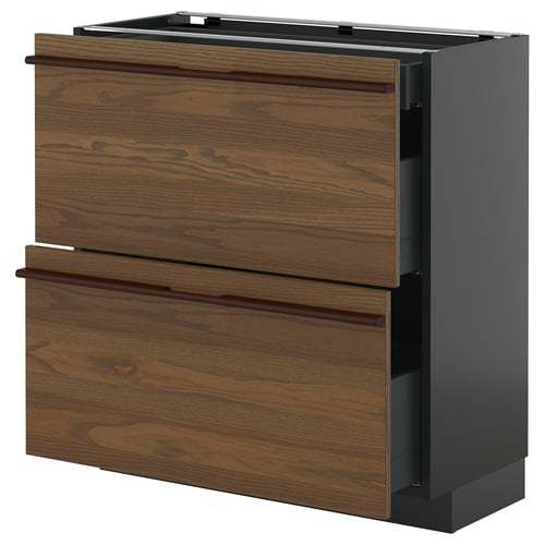 An ikea METOD kitchen unit in dark brown stain with wooden handles, featuring two drawers and a cabinet.