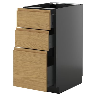 Modern kitchen unit: METOD in black with oak drawers, minimalist, sturdy, ample storage.