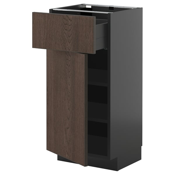 Modern kitchen cabinet: METOD with dark brown sinarp wood, one open drawer, two shelves.