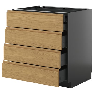 A modern black and wooden kitchen cabinet with four drawers, combining dark and light tones for a sleek look.