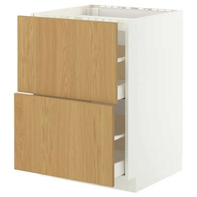 METOD white cabinet with light wood drawers.
