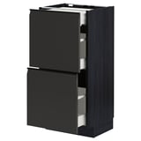 METOD kitchen unit in matte black with sleek, modern drawers.