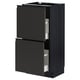 Black METOD kitchen cabinet with open drawers, modern design.
