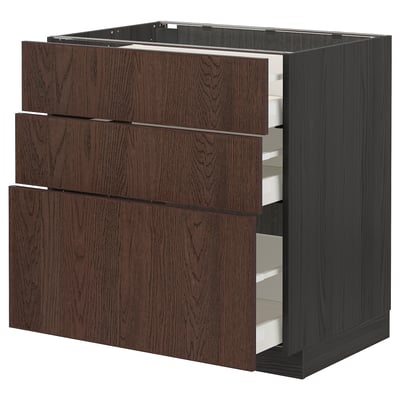 Dark brown ikea METOD kitchen unit with three wood-edged drawers.