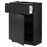 Modern black METOD kitchen cabinet with pull-out drawer, sleek matte finish, and integrated handle.