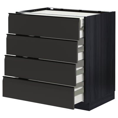 Black kitchen drawer unit with four drawers and sturdy handles.