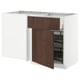 Modern white kitchen island with dark brown wooden accents and open shelving.