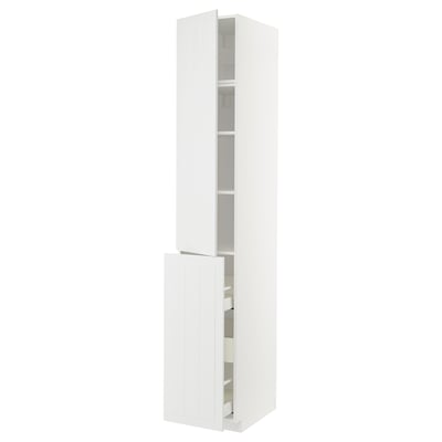 A white METOD kitchen cabinet with adjustable shelves and a drawer. The cabinet is tall and rectangular, featuring multiple compartments for storage.