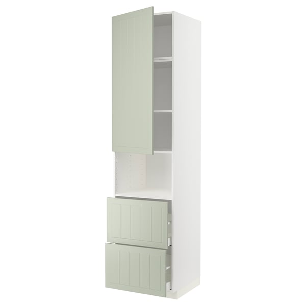 This image shows a tall, white kitchen cabinet with light green doors and drawers, featuring a modern and crafted design.