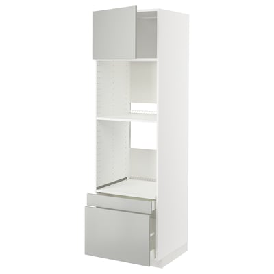 White METOD kitchen unit with light grey drawers and shelves, modern design.