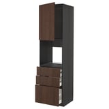 Dark brown ikea METOD kitchen unit with open drawers.