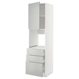 A white METOD kitchen cabinet with light grey drawers and a closed top section.