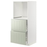 Depicts a METOD kitchen unit in green with a modern design, featuring adjustable shelves and smooth-running drawers.