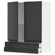 Modern black kitchen cabinet with sleek, matte finish and integrated handle, featuring a handle-less design.