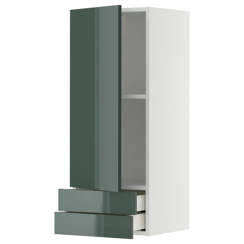 Modern glossy green wall cabinet with pull-out drawers.