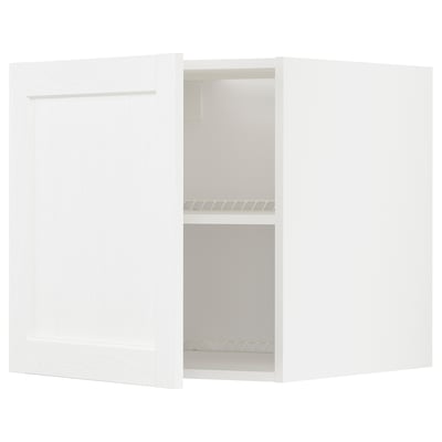 White kitchen cabinet with door open, showing two shelves inside. Modern design with subtle grain texture.