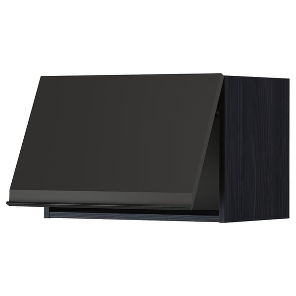 Black modern kitchen unit with minimalist design and sleek handle.