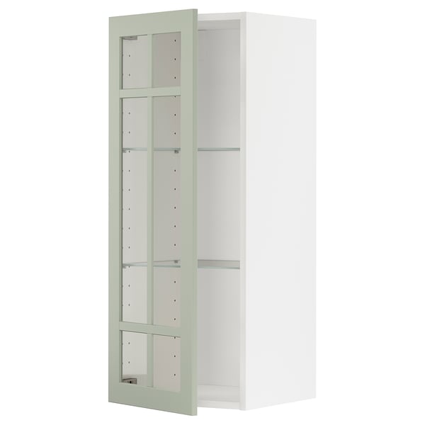 METOD wall cabinet with green glass door, shaped square with adjustable shelf.