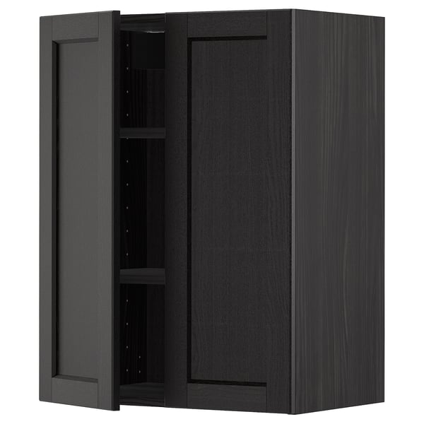 Black stained kitchen cabinet with beveled edges and adjustable shelf.