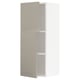 Beige METOD kitchen cabinet with two adjustable shelves.