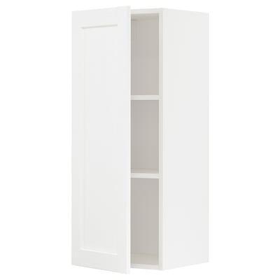 White METOD kitchen cabinet with adjustable shelf.