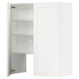 A white METOD kitchen cabinet with open doors, revealing adjustable shelves inside.
