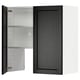 A METOD kitchen cabinet in black with a bevelled edge design, featuring an open door revealing adjustable shelves.