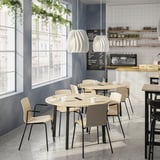 MITTZON conference table with chairs, lamps, and greenery.