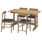 The NACKANÄS wooden dining set, including a table and four chairs with woven black seats, set against a white background.