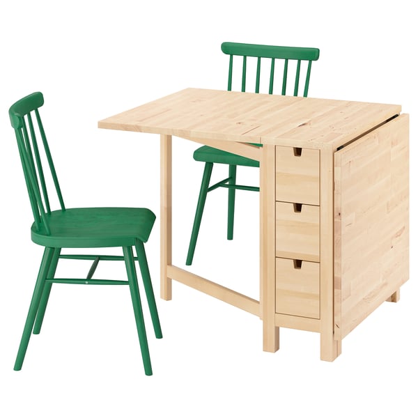 Notched light wood folding table with 2 green chairs. Natural wood top, green metal chairs.