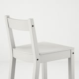 White wooden chair with curved back, sturdy design, smooth finish.