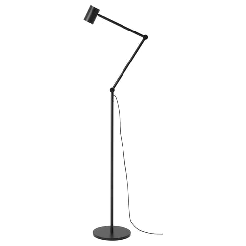 Black NYMÅNE floor lamp with adjustable arm, modern, minimalist design, stands on circular base.