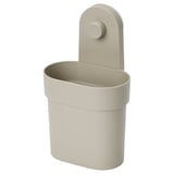 A beige plastic wall-mounted bathroom caddy, cylindrical with a rounded top and bottom, featuring a suction cup for secure attachment.