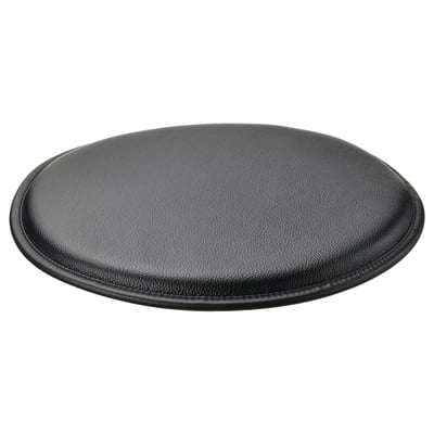 Black circular PÄRLETERNELL seat cushion. Soft leather, embossed finish, edge stitching. Adds comfort and style to chairs.