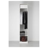 White wardrobe with hangers, folded clothes, and bag.