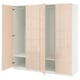 An open peach-colored ikea PAX wardrobe with adjustable shelves.