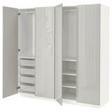 White PAX wardrobe with mirrored doors, mesh basket, adjustable shelves.