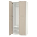 An open beige and white PAX wardrobe with one door, showcasing shelves and a hanging rod.