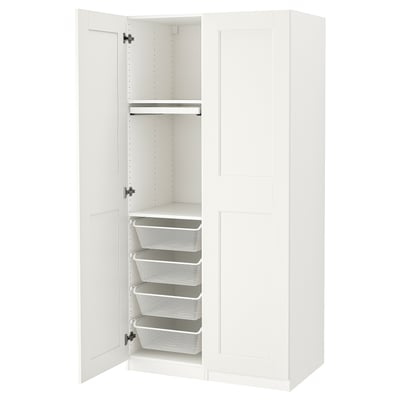 White PAX wardrobe with mesh drawers, metal fittings, minimalist design.