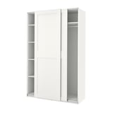 A white PAX wardrobe with sliding doors, minimalist design, and frosted glass inserts.