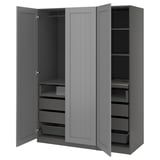 An open gray PAX wardrobe with drawers and shelves.