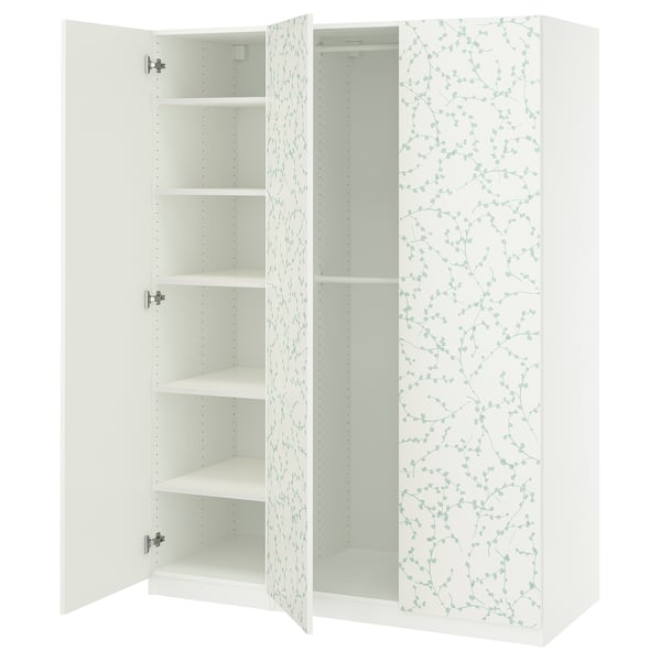 An open white ikea PAX wardrobe with adjustable shelves and a patterned door.